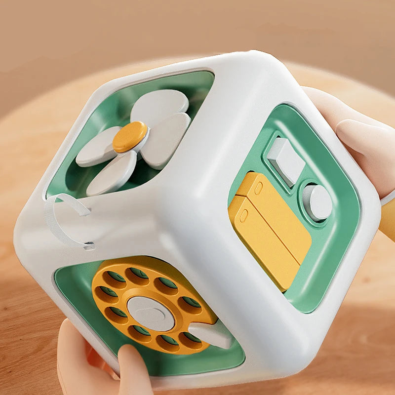 Cubo Montessori 6 em 1 – Brinquedo Sensorial Educativo com Atividades para Bebês Descubra um mundo de aprendizado e diversão em um só brinquedo!